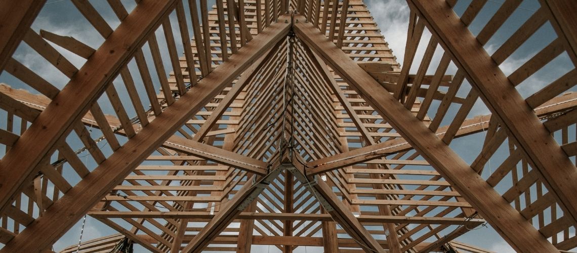 Timber roof frame structure inside of a roof