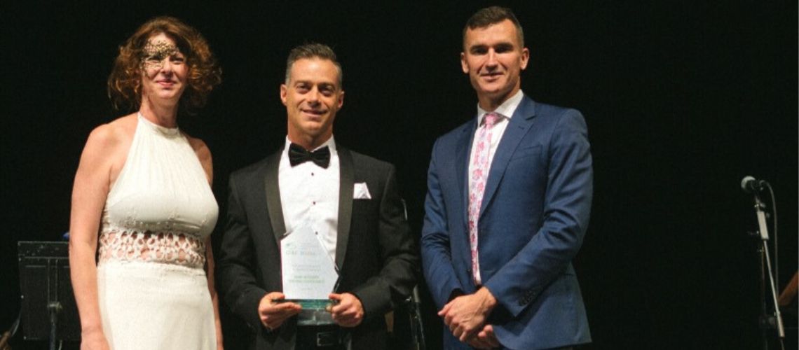Home Integrity owner wins and presents strata service award on stage